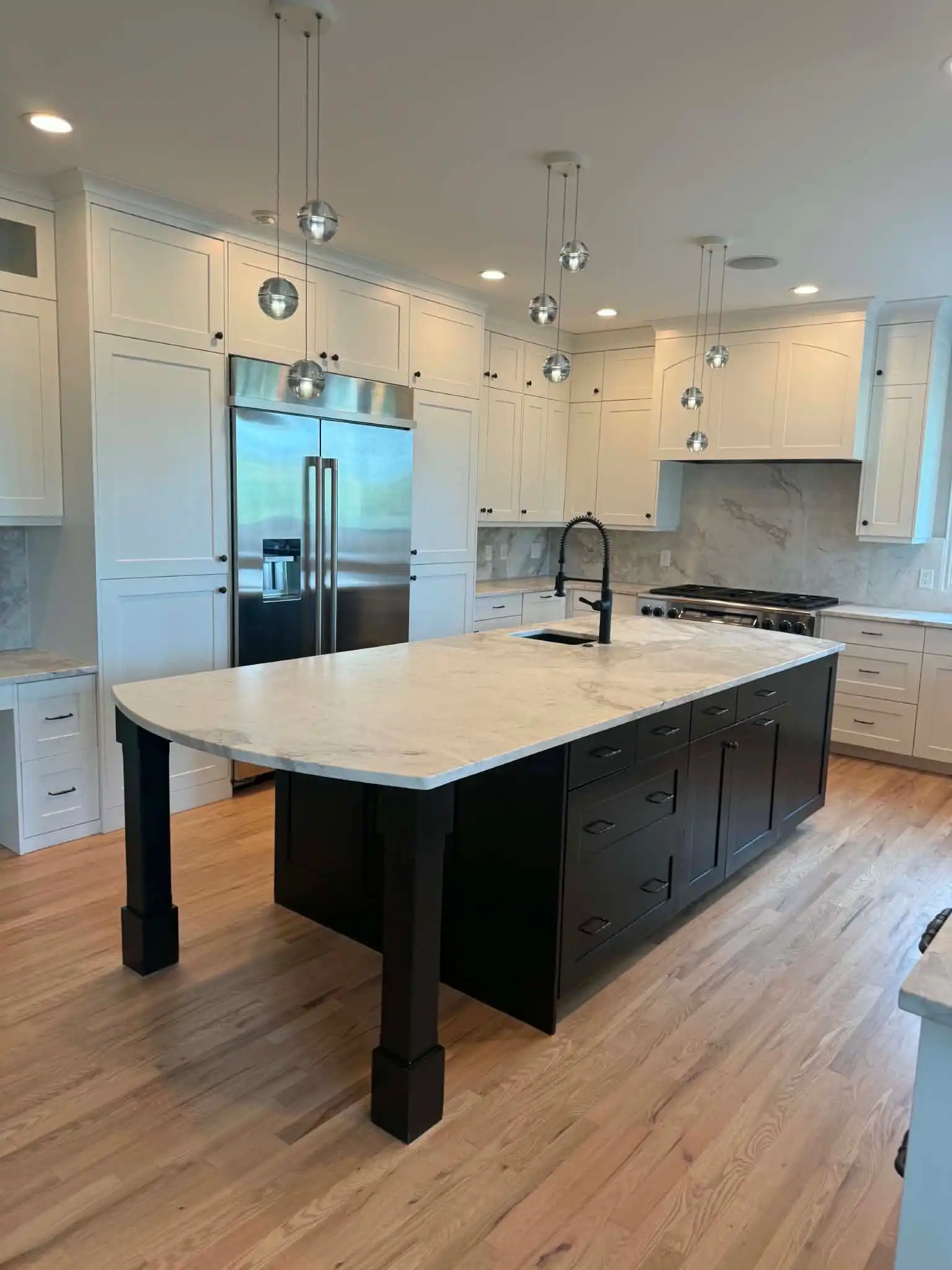 Home Remodeling in Denver 7 Modern-kitchen-island-marble-countertop_denver Colorado